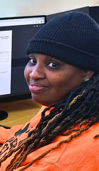 Tabitha, Dispatch Head at Golden Class Limo, at her dispatch desk
